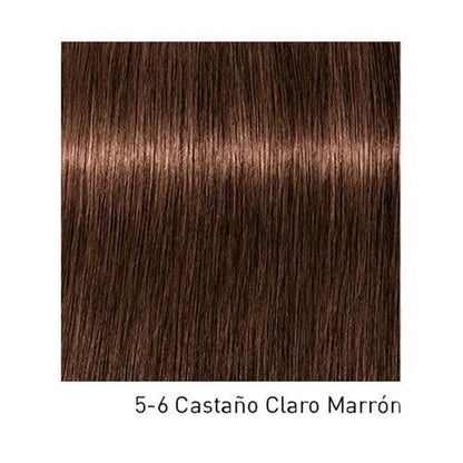 Tinte Schwarzkopf Igora Royal en botella, muestra el color y la textura de la tintura para cabello.