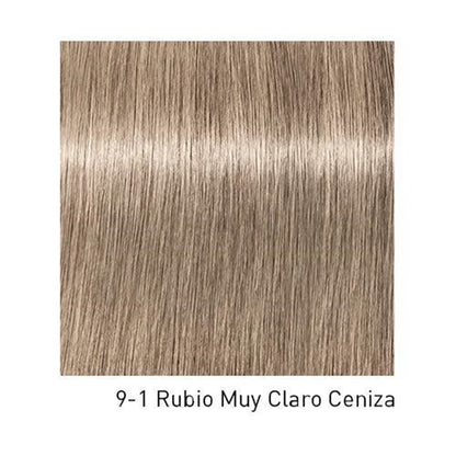 Tinte Schwarzkopf Igora Royal en botella con coloración para cabello en tono rubio oscuro, mostrando la caja y el producto.