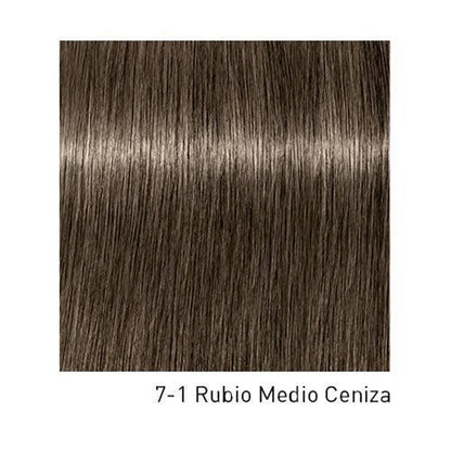 Tinta para cabello Schwarzkopf Igora Royal en caja, muestra tonos de color y técnica de aplicación en la imagen.