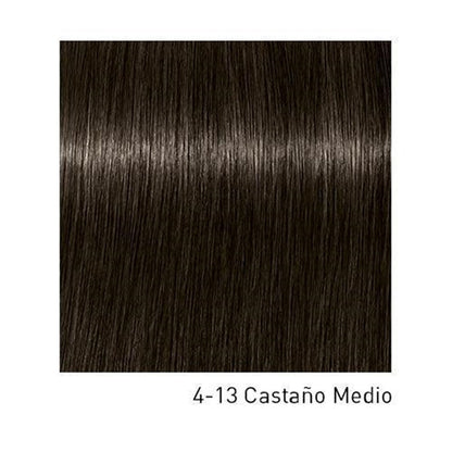 Tinte Schwarzkopf Igora Royal en caja con tonos de color y herramientas de aplicación, para cabello profesional y de calidad.