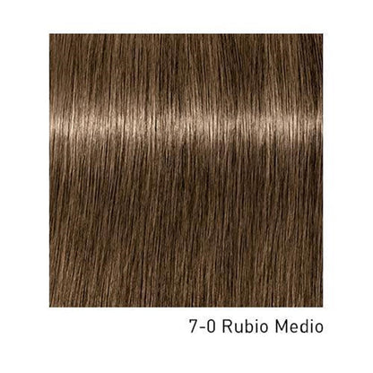 Tinte Schwarzkopf Igora Royal para cabello, botella de tintura con tono vibrante, visible en la imagen 10785.jpg