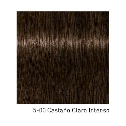 Tinte Schwarzkopf Igora Royal para cabello, botella con coloración en tonos vibrantes y acabado profesional.