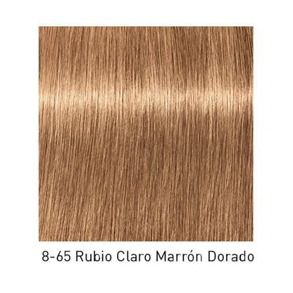 Tinte Schwarzkopf Igora Royal en tubo de color castaño oscuro, muestra el producto para teñir el cabello.
