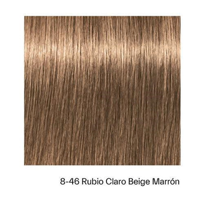 Tinte Schwarzkopf Igora Royal en botella, mostrando el envase de la tintura para el cabello con diseño y colores vibrantes.