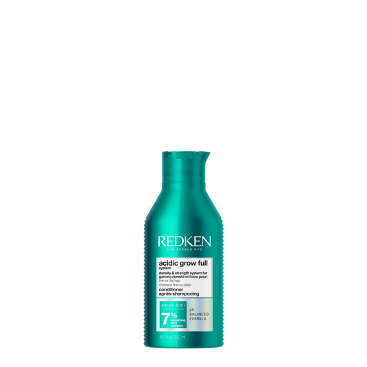 Botella plateada de 300ml de Acondicionador Redken Acidic Bonding Concentrate, tratamiento profesional con pH ácido para reparar y fortalecer el cabello dañado