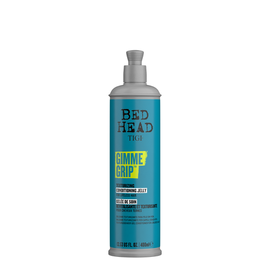 Acondicionador Bed Head Gimme Grip Tigi, frasco de 400 ml, con botella y tapa visible, para cabello con volumen y control.
