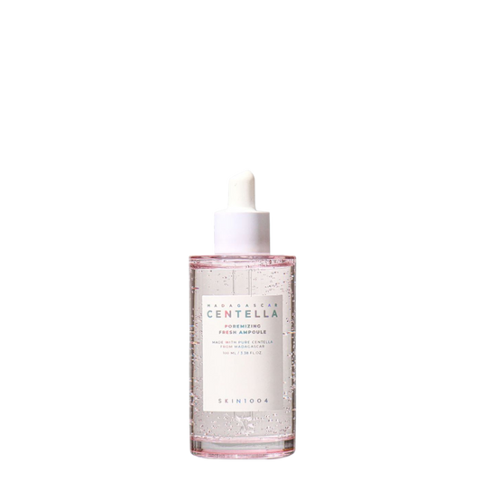 Botella de vidrio de 100 ml con gotero de la ampolla coreana Madagascar Centella Poremizing Fresh Ampoule de la marca Skin1004, sérum purificante para el control de poros y la oleosidad del rostro.