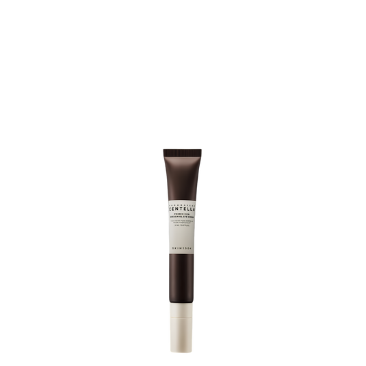 Tubo de 20 ml con aplicador metálico del contorno de ojos coreano Madagascar Centella Probio-Cica Bakuchiol Eye Cream de la marca Skin1004, crema antiedad para arrugas y ojeras.