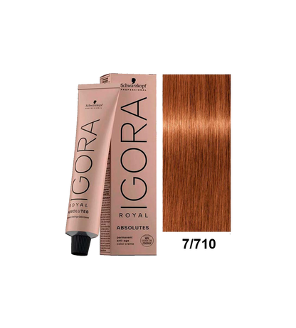 Tinte Schwarzkopf Igora Absolute tono 7.710 con frasco y etiqueta visible, color rubio claro con reflejos dorados.