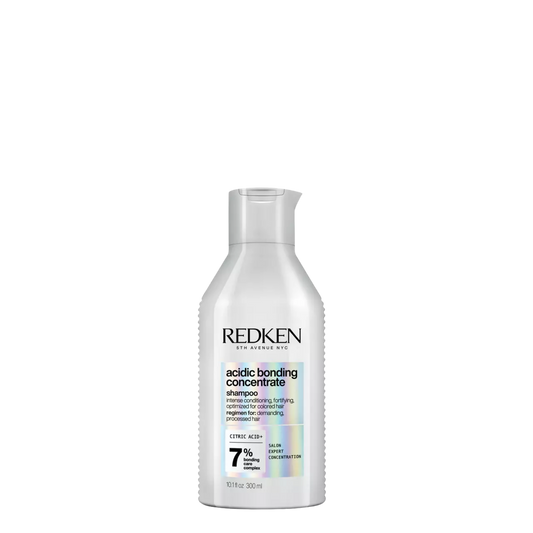 Champú Redken Acidic Bonding Concentrate en botella de 500 ml, con fórmula para fortalecer y reparar el cabello dañado.