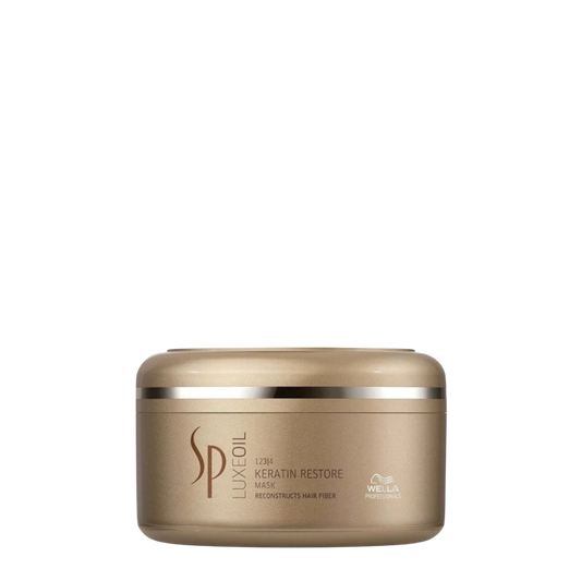 Pote de Mascarilla Reconstructora Wella System Professional SP Luxe Oil Keratin Restore de 150ml, crema de tratamiento intensivo con queratina y aceites esenciales.