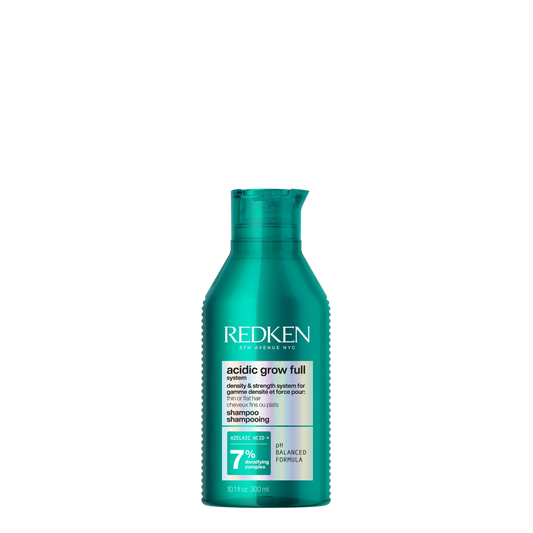 Champú Redken Acidic Grow Full para volumen, 300 ml, con botella de shampoo y etiqueta visible en la imagen