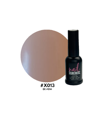 Esmalte Nail Pro X001-X083 en frasco con color rosa claro y aplicador, exhibido sobre fondo blanco.