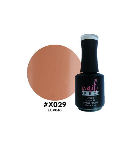 Esmalte Nail Pro X001-X083 de color rosa claro en frasco con tapa blanca, visible en la imagen.