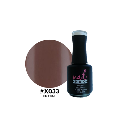 Esmalte Nail Pro X001-X083 en frasco con color gris claro, diseño elegante y acabado brillante.