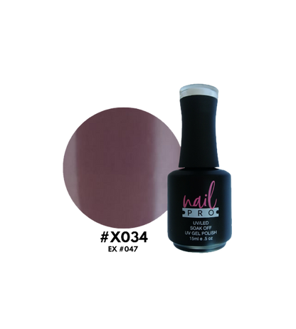 Esmalte Nail Pro X001-X083 en botella con acabado brillante y color vibrante, muestra detalles de la etiqueta y la tapa.