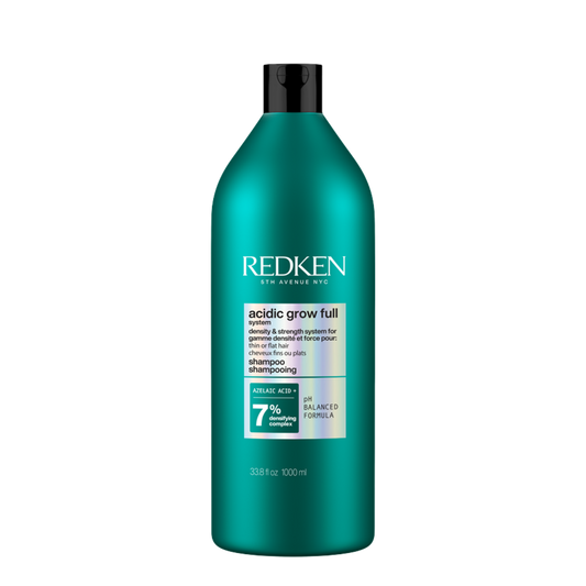 Champú Redken Acidic Bonding Concentrate 1L en botella con etiqueta roja y detalles en negro, para cuidado del cabello.